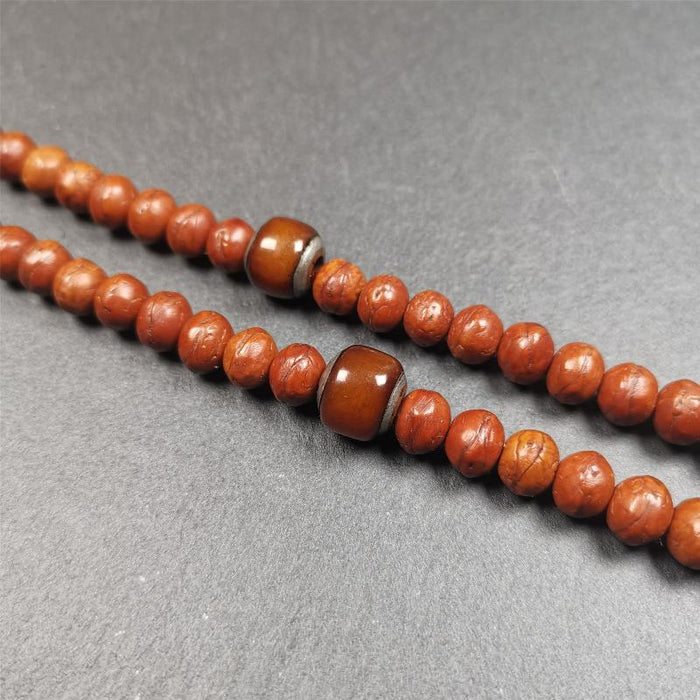 1 Pair of Yak Bone Beads 0.47" - Tibetan Buddhist art, front view