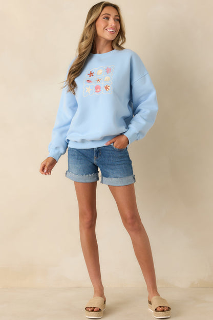 Collected Moments Light Blue Embroidered Crewneck Sweatshirt