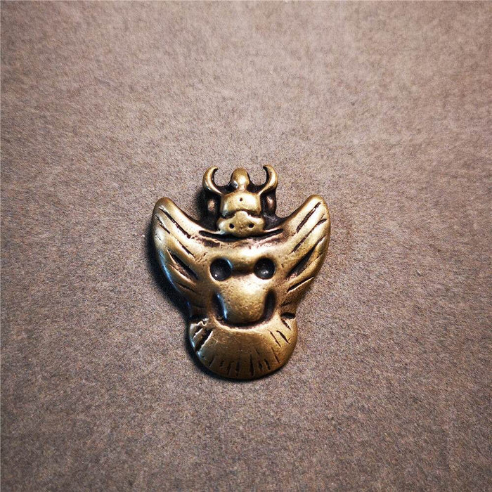 Amulet Garuda,Garula,Suparna - Tibetan Buddhist amulet, close-up detail