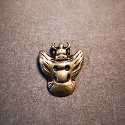 Amulet Garuda,Garula,Suparna - Tibetan Buddhist amulet, close-up detail