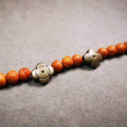 Amulet ,Gesong Flower Marker Spacer Bead for Prayer Bead,Mala - Tibetan Buddhist mala beads, close-up detail