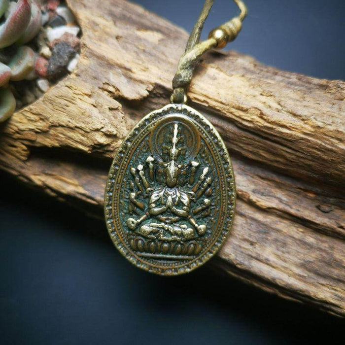 Amulet,Avalokitesvara,Padmapani,Kuanyin Pendant - Tibetan Buddhist amulet, detailed view