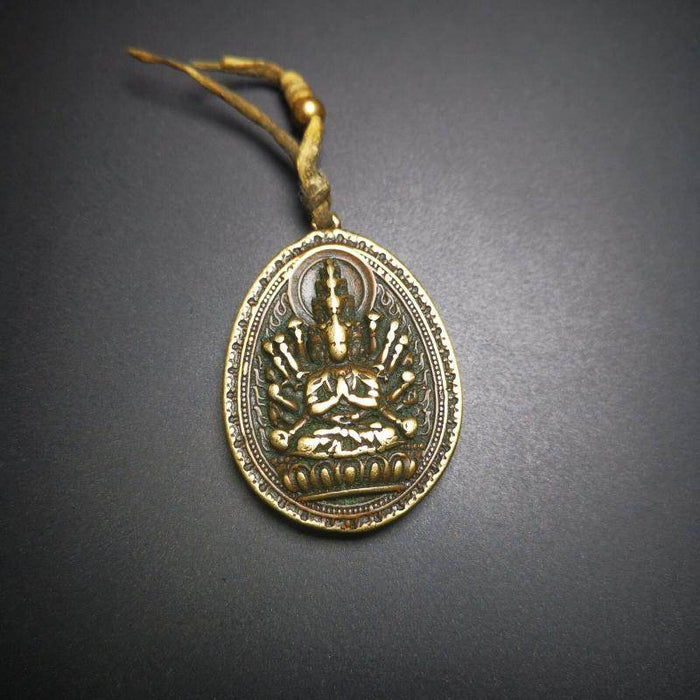 Amulet,Avalokitesvara,Padmapani,Kuanyin Pendant - Tibetan Buddhist amulet, close-up detail