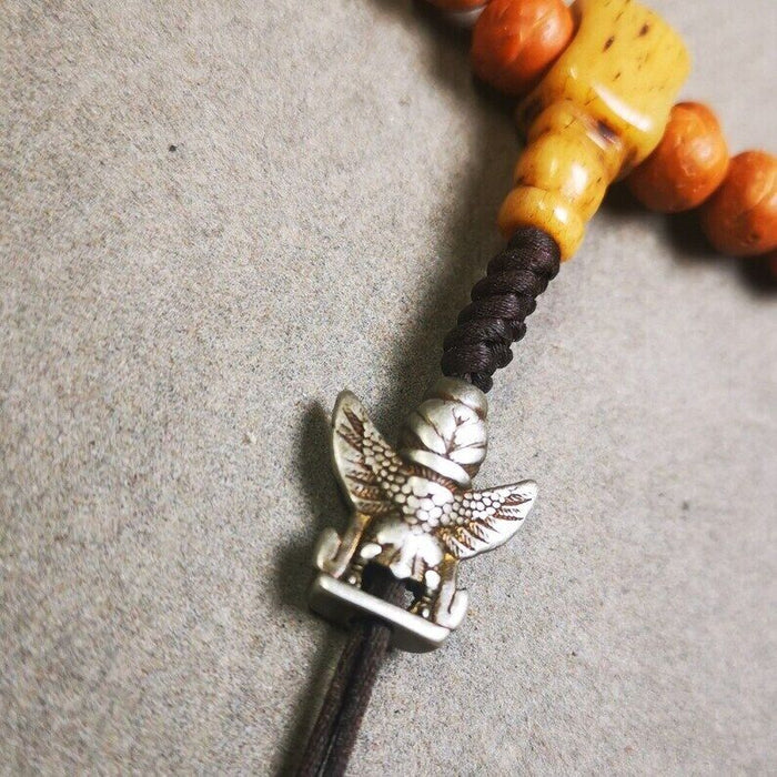 Amulet,Garuda Pendant,Prayer Bead,0.7" - Tibetan Buddhist amulet, close-up detail