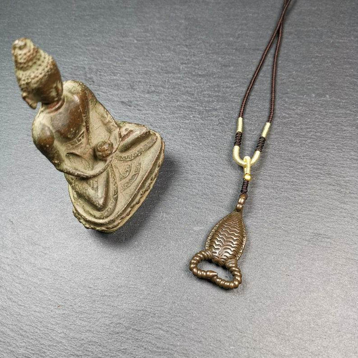 Amulet,Scorpion Guru of Padmasambhava, Buddhist Scorpion Totem Pendant - Tibetan Buddhist amulet, close-up detail