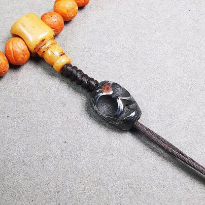 Amulet,Skull Citipati Spacer Pendant Bead for Mala,Necklace,Prayer Bead - Tibetan Buddhist mala beads, close-up detail
