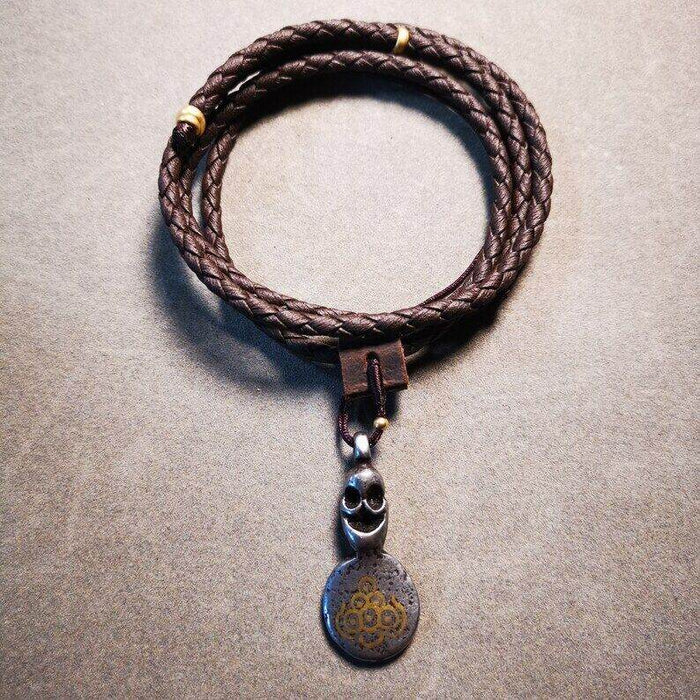 Amulet,Skull Sītavana Flame Pendant Leather Necklace - Tibetan Buddhist bead necklace, front view