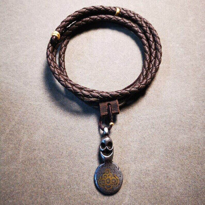 Amulet,Skull Sītavana Flame Pendant Leather Necklace - Tibetan Buddhist bead necklace, front view