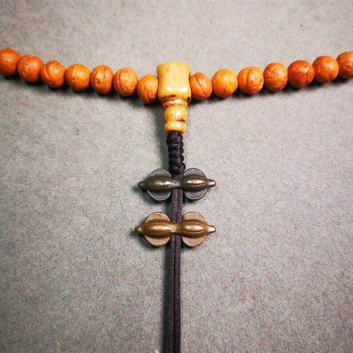 Amulet,Vajra Pendant for Mala,Bag Hanging,Prayer Bead - Tibetan Buddhist mala beads, close-up detail