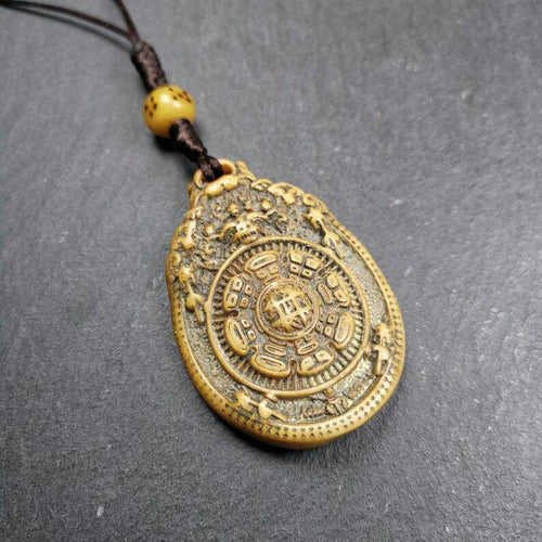 Buddhist Calendar Amulet,Yak Bone Carved Melong Mirror,SIPAHO srid pa ho Badge - Tibetan Buddhist amulet, front view