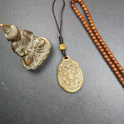 Buddhist Calendar Amulet,Yak Bone Carved Melong Mirror,SIPAHO srid pa ho Badge - Tibetan Buddhist amulet, close-up detail