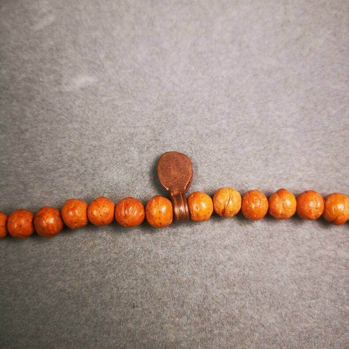 Buddhist Mala Counter Clip - Tibetan Buddhist mala beads, close-up detail