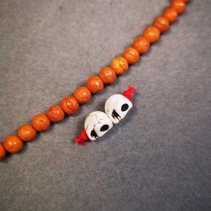 Citipati Skull Marker Beads 0.4" - Tibetan Buddhist art, detailed view