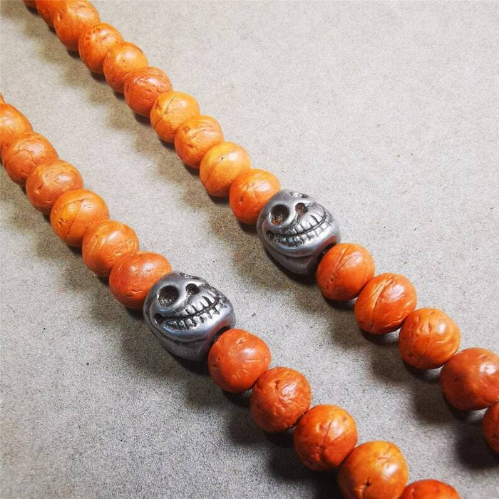 Citipati Skull Marker Beads 0.4" - Tibetan Buddhist art, front view