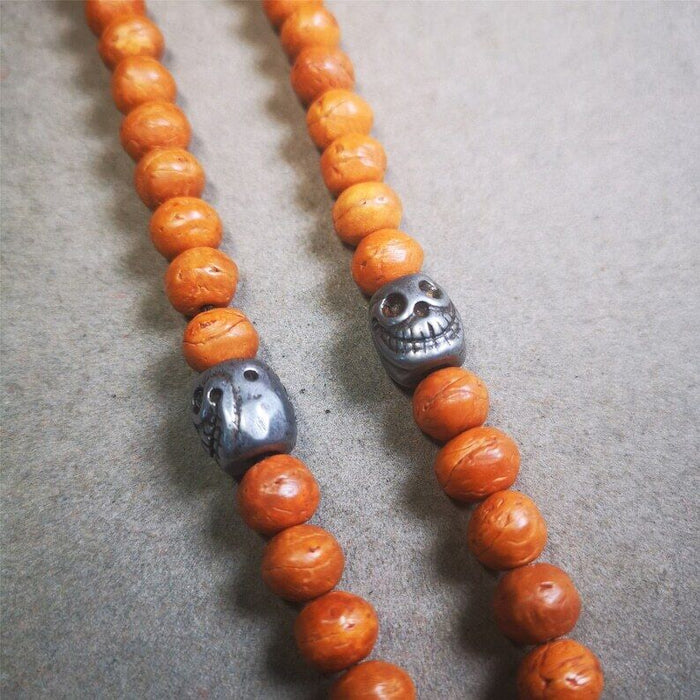 Citipati Skull Marker Beads 0.4" - Tibetan Buddhist art, close-up detail