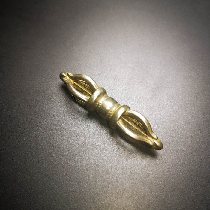 Five-pronged Vajra Amulet - Tibetan Buddhist amulet, close-up detail