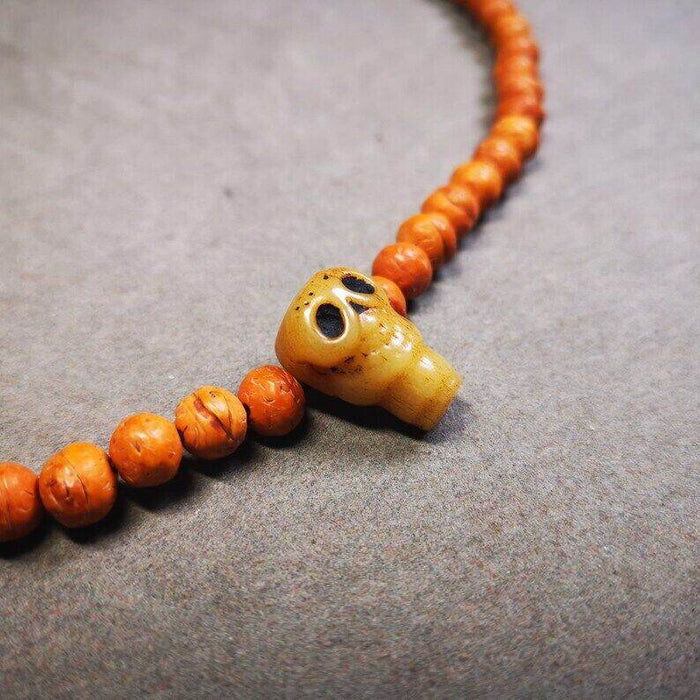 Guru Bead, T-drilled 3-Hole Bead for Prayer Bead - Tibetan Buddhist art, close-up detail