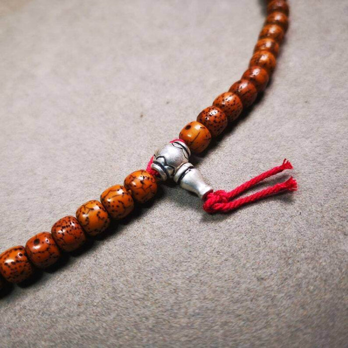 Guru Bead, T-drilled 3-Hole Bead - Tibetan Buddhist art, detailed view