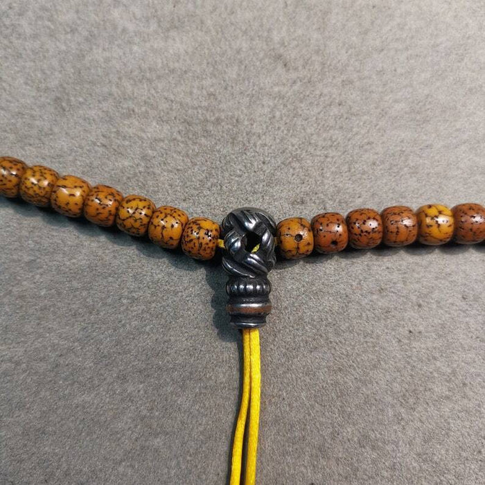 Lucky Knot T-drilled 3-Hole Bead for Prayer Bead,0.8" - Tibetan Buddhist art, close-up detail