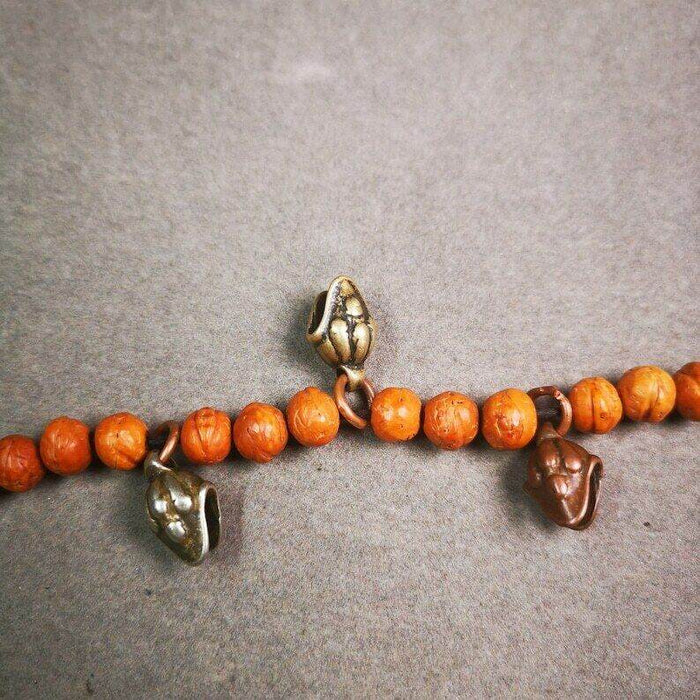 Mala Amulet,Mani Jewel/Wish-Fulfilling Cintamani - Tibetan Buddhist mala beads, detailed view