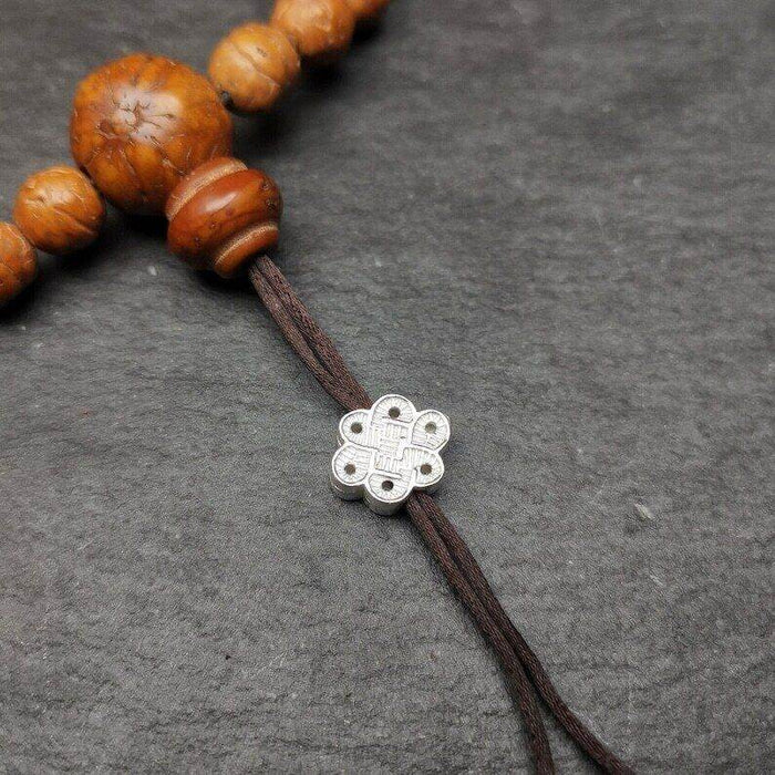 Mala Bead Pendant,Sterling Silver Lucky Knot Bead,Endless Knot - Tibetan Buddhist mala beads, front view