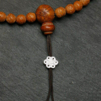 Mala Bead Pendant,Sterling Silver Lucky Knot Bead,Endless Knot - Tibetan Buddhist mala beads, close-up detail
