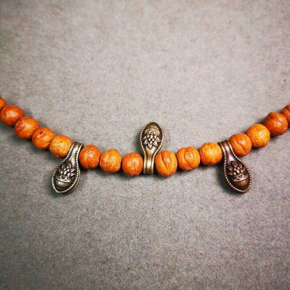 Mala Counter Clip - Tibetan Buddhist mala beads, close-up detail