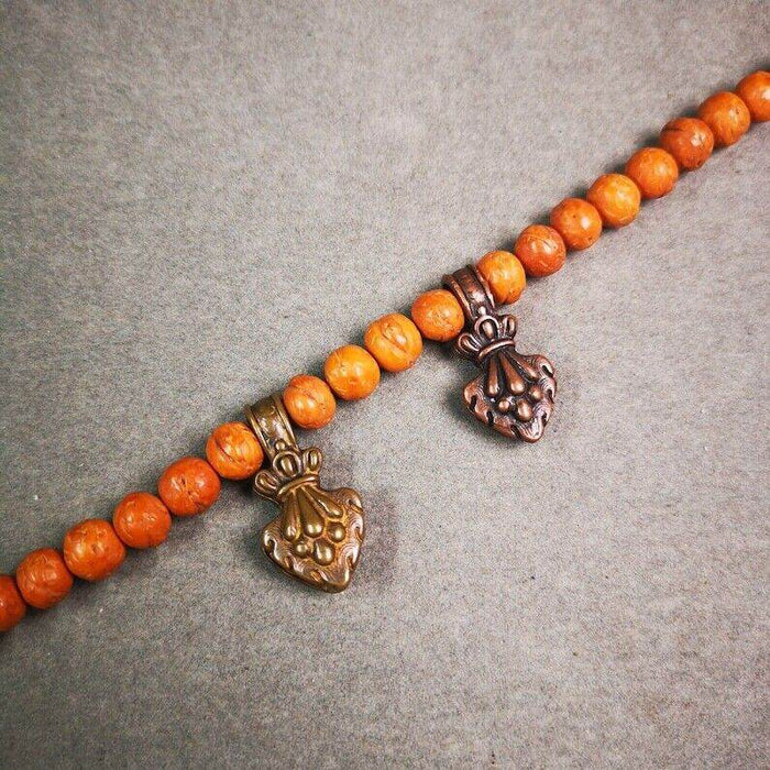 Mala Counter Clip - Tibetan Buddhist mala beads, close-up detail