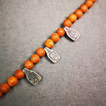 Mala Counter Clip,Drashi Lhamo - Tibetan Buddhist mala beads, close-up detail