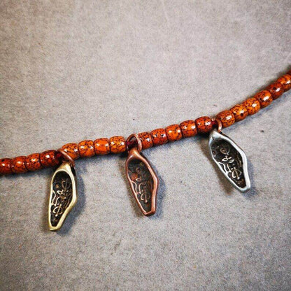 Mala Counter Pendant,OM Bead Amulet - Tibetan Buddhist mala beads, close-up detail