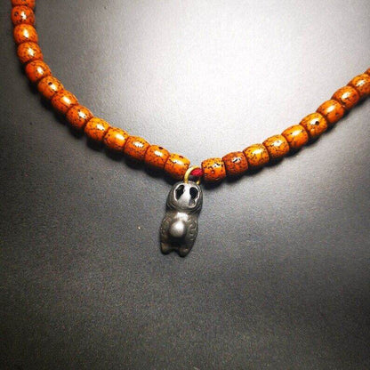 Mala Counter, Snow Lion Pendant - Tibetan Buddhist mala beads, close-up detail
