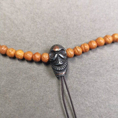 Mala Guru Bead, Skull Shape T-drilled 3-Hole Bead - Tibetan Buddhist mala beads, front view