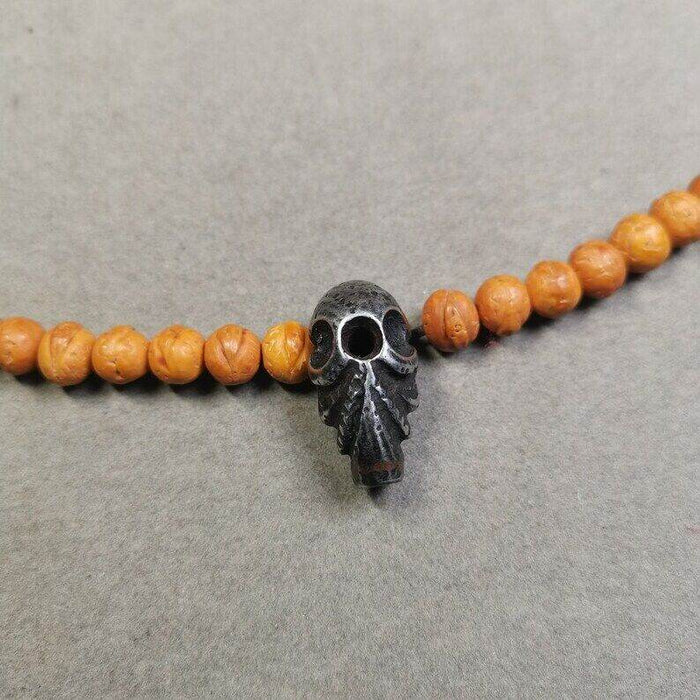 Mala Guru Bead, Skull Shape T-drilled 3-Hole Bead - Tibetan Buddhist mala beads, close-up detail