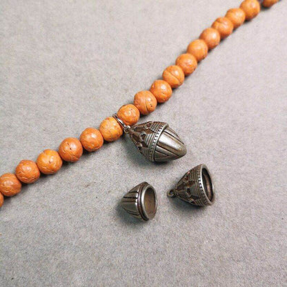 Mala Pendant,Niangla Tsa Tsa Stupa Gau Shrine Amulet - Tibetan Buddhist mala beads, detailed view