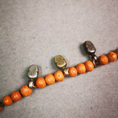 Mala Pendant,Skull Citipati Amulet for Prayer Beads - Tibetan Buddhist mala beads, close-up detail