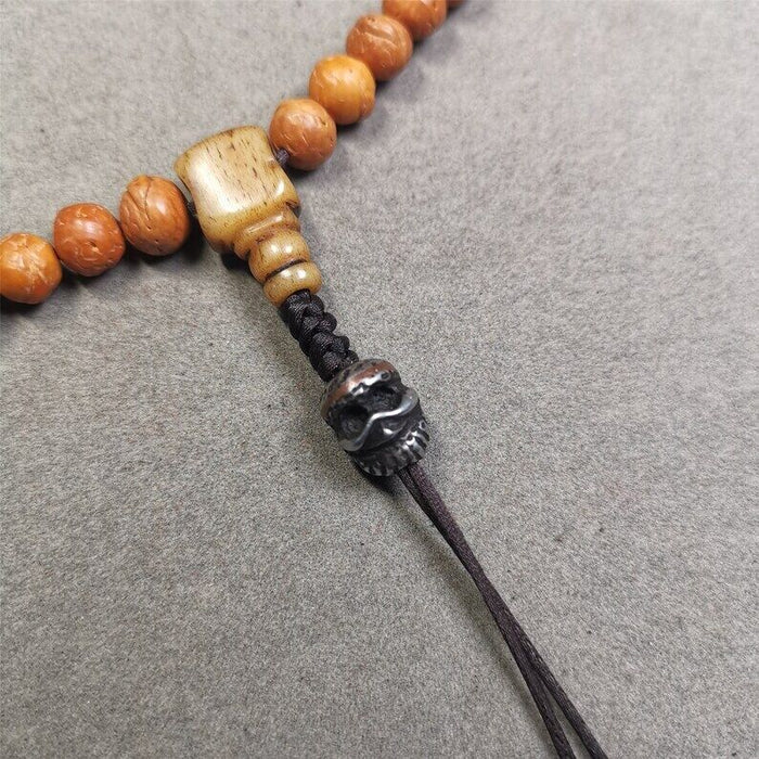 Mala Spacer Bead,Skull Citipati Marker Bead 0.43" - Tibetan Buddhist mala beads, close-up detail