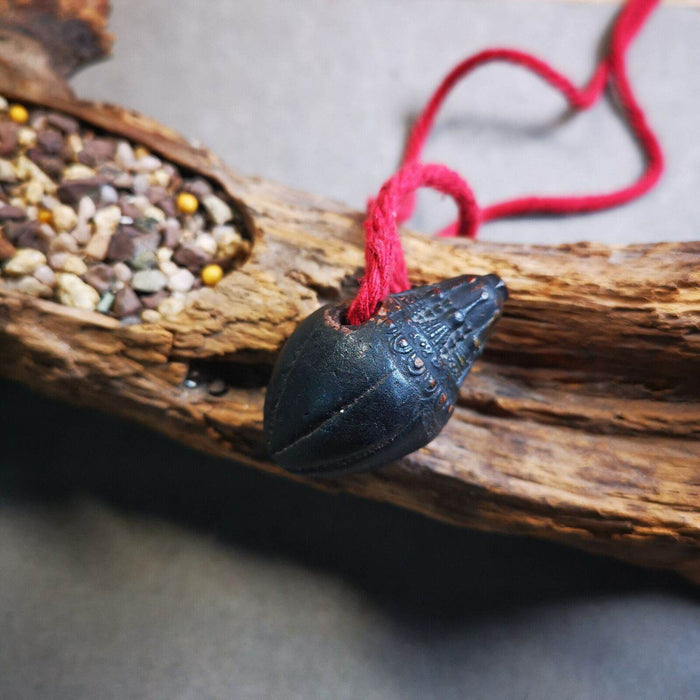 Niang La Tsa Tsa Statue,Stupa Amulet,Pagoda,Scorpion Stamp - Tibetan Buddhist amulet, close-up detail