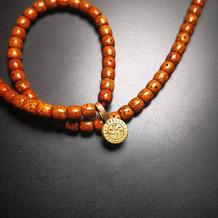 Old Buddhist Mala Counter Clip - Tibetan Buddhist mala beads, close-up detail