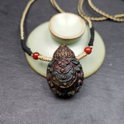 Old Tibetan Tsa Tsa Amulet, Scorpion Guru of Padmasambhava,Scorpion Terma Amulet - Tibetan tsa tsa mold, close-up detail