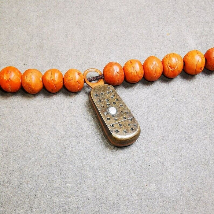 Pendant,Mantra Dot Charm Amulet 1.34" - Tibetan Buddhist amulet, front view