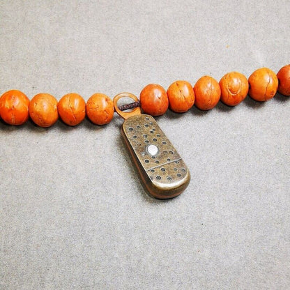 Pendant,Mantra Dot Charm Amulet 1.34" - Tibetan Buddhist amulet, front view