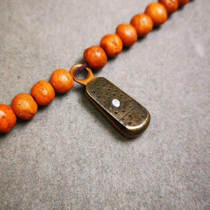 Pendant,Mantra Dot Charm Amulet 1.34" - Tibetan Buddhist amulet, close-up detail