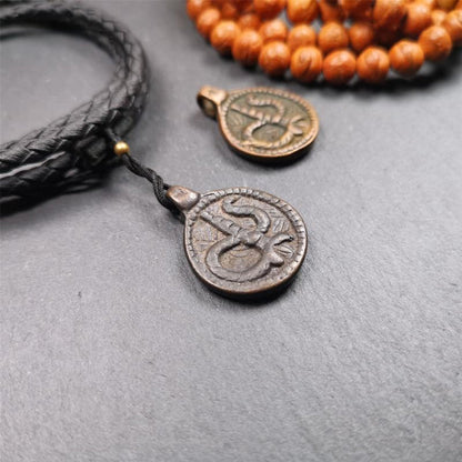 Rod of Asclepius Amulet 0.87" - Tibetan Buddhist amulet, close-up detail