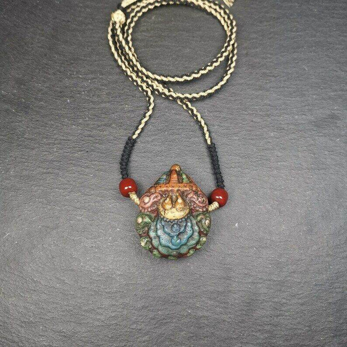 Stupa Tsa Tsa Amulet, Scorpion Guru of Padmasambhava, Scorpion Terma Pendant - Tibetan Buddhist amulet, detailed view