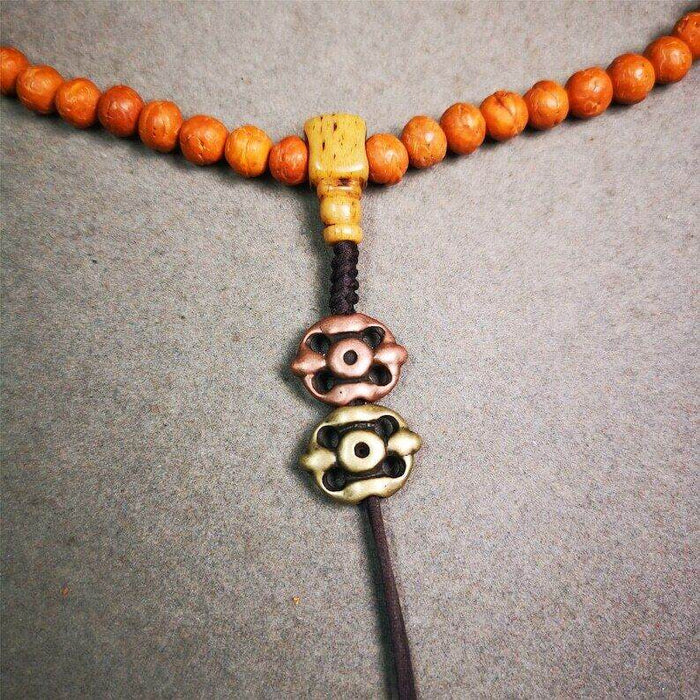 Tibetan Amulet,Vajra Pendant for Mala - Tibetan Buddhist mala beads, close-up detail