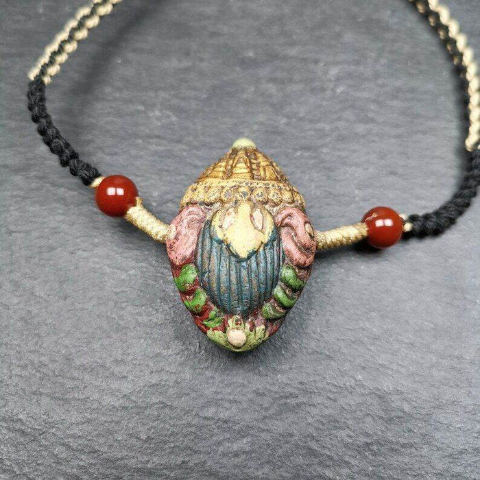 Tibetan Stupa Tsa Tsa Amulet, Double-sided Vajra and Bodhi Leaf Shape Pendant - Tibetan Buddhist amulet, front view