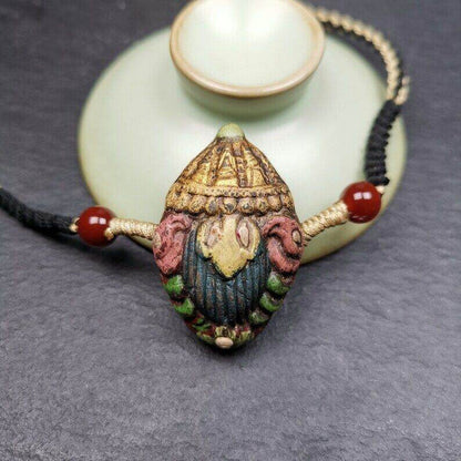 Tibetan Stupa Tsa Tsa Amulet, Double-sided Vajra and Bodhi Leaf Shape Pendant - Tibetan Buddhist amulet, detailed view