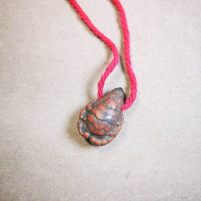 Tsa Tsa Statue Amulet,Scorpion Guru of Padmasambhava - Tibetan Buddhist amulet, close-up detail