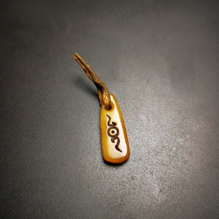 Yak Bone Carved Amulet Pendant 1.06" - Tibetan Buddhist amulet, close-up detail