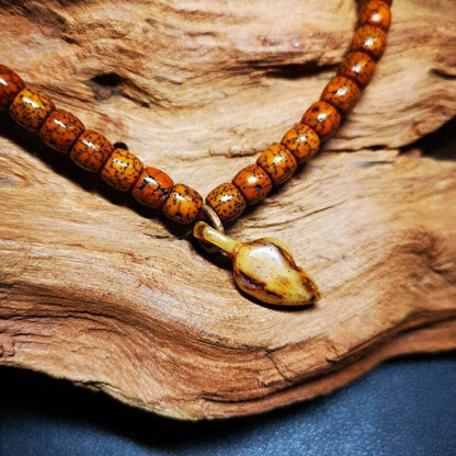 Yak Bone Carved Conch Prayer Bead Pendant,Bead Counter Clip Amulet for Mala - Tibetan Buddhist mala beads, detailed view